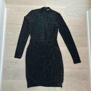 Never worn Michael Kors stretchy sparkly long sleeve dress.